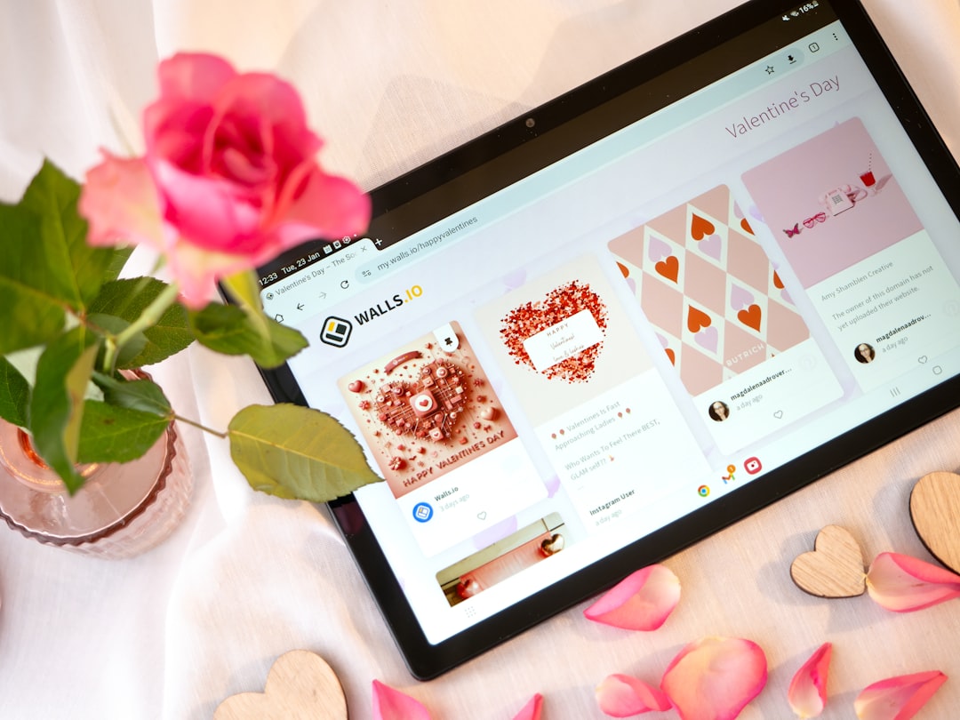 services-03 White background with a tablet and a romantic setup with candles, hearts and rose petals